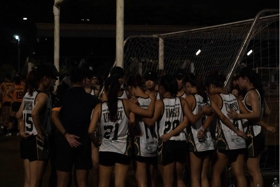 A group of girls in sports uniforms Description automatically generated (1)